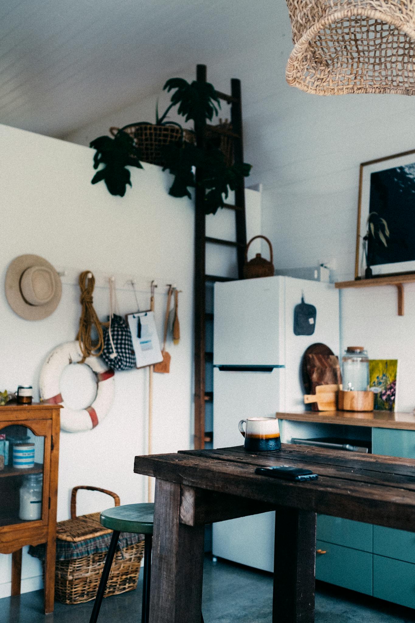 A rustic kitchen with wooden accents and vintage decor, creating a warm and inviting atmosphere.